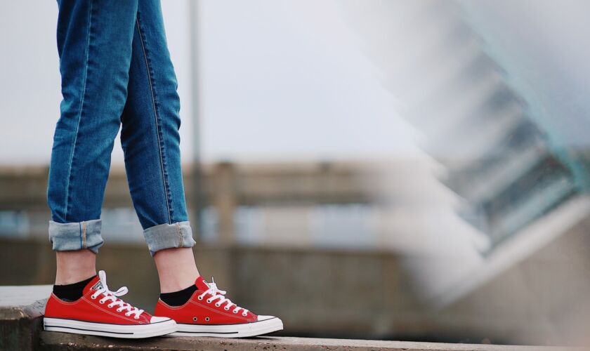 A young person in red trainers stepping up — the transition to secondary school is a tipping point for many learners with FASD